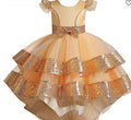 Girls sequin dress front view. Girls sequin dress side view. Girls sequin dress detail view.